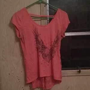 A hybrid salmon colored shirt